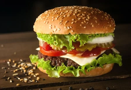Beef burger with cheese and salad