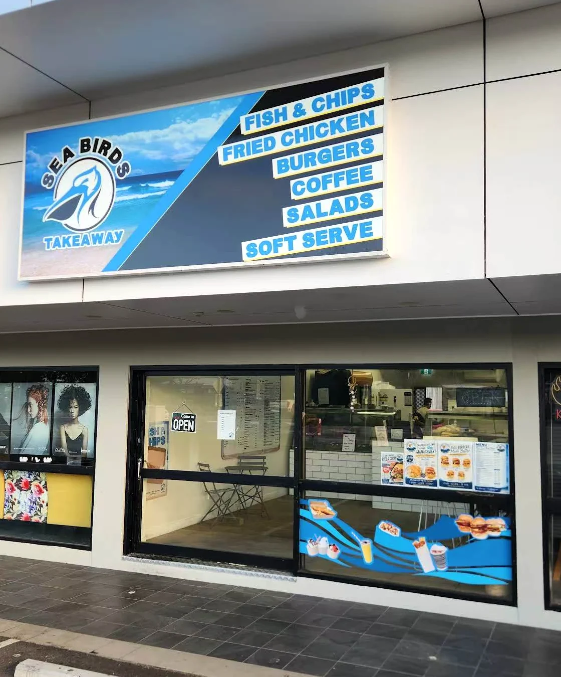 Seabirds Takeaway shopfront with its blue pelican sign on Swallow Street